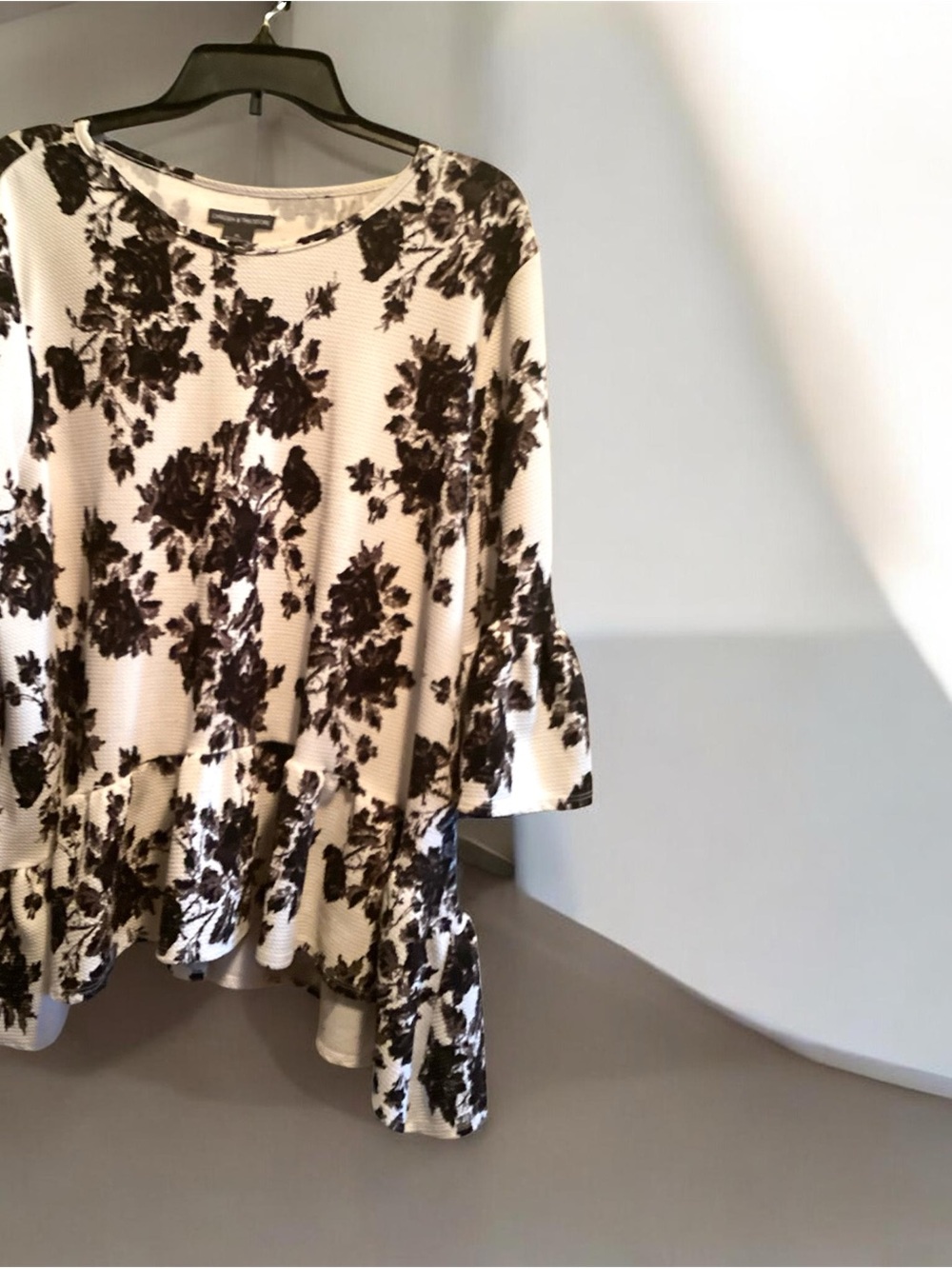 Chelsea & Theodore Black Floral Ruffle-Hem Tunic on Cream